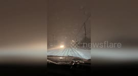 Blizzard blankets roads in two inches of snow in Kentucky