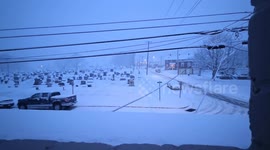 Thick snowfall blankets neighborhood in Brackenridge, Pennsylvania, USA