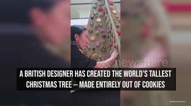 British designer creates 12-foot Christmas Tree crafted from 1,000 cookies