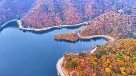 China: Colorful late autumn foliage lights up China’s Longtan River
