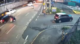 Hapless skateboarder falls over causing motorcycle crash