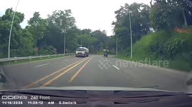 Wheel flies off moving minivan and bounces across road