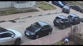 Woman smashes parked car with manhole cover in Olgino, Russia
