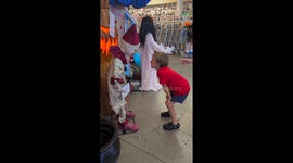 Boy startled by moving clown display in Los Angeles, USA