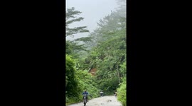 Landslide crashes onto road following weeks of heavy rain in the Philippines