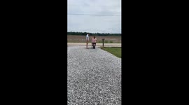 Funny moment girl drives minibike straight into water-filled ditch in Louisiana