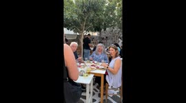 Heartwarming moment daughter travels from Australia to Greece to surprise unsuspecting family at dinner