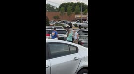 Tense parking lot standoff sees man daring rival to 'pull that gun out' in Kentucky