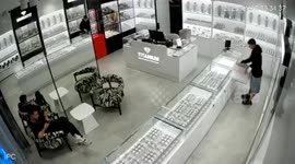 Masked thieves flee after employees at jewellery shop activate security smoke screen