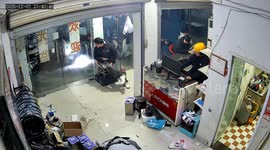 Delivery driver slams into repair shop - smashing owner's tooth and causing head fracture