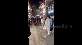 Staff dress as 'imperial guards' to patrol streets and pick up litter in China