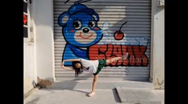 Little Yoga Star Strikes Adorable Poses on the Streets of Melaka