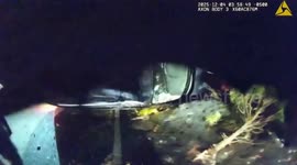US: Officers Pull Driver From Burning Car After Utility Pole Crash