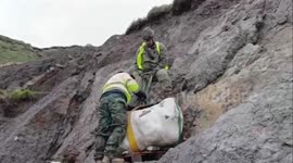 Spain: Giant Dinosaur Fossils Airlifted From Ribadesella Cliffs With Army Support