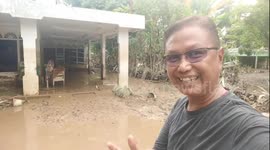 Resident Shows Condition of Home Following Floods in Samalanga, Aceh