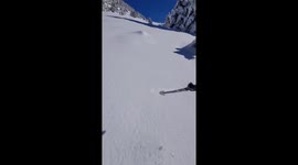 Walking through deep snow in Isaba, Navarrese Pyrenees, Spain