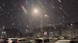 Heavy wet snow reduces visibility in Norman, Oklahoma, USA