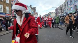 This years Santacon a London gets underway in Camden. Huge amounts of Santas gathered to celebrate