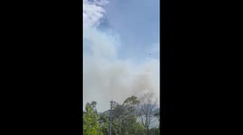 Compact low-flying drone monitors Koolewong bushfire in New South Wales, Australia