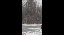 Steady heavy snow blankets the area in South Riding, Virginia, USA