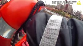 Cop leaps into freezing New York Harbor to save struggling man