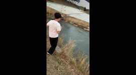 Boy sinks through thin ice while trying to run across frozen water in Incheon, Korea