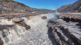 China: Double rainbows, icicles form spectacular winter scenery of Yellow River's Hukou Waterfall