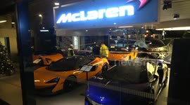 Supercar Carnage: Pickup Truck Driver Causes Chaos After Crashing Into McLaren Dealership