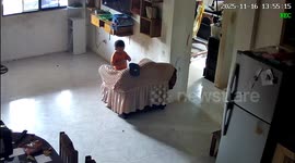 Curious toddler sets armchair on fire while playing with match left lying around