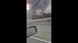 Large roadside fire seen from passing vehicle in Aioi, Hyōgo, Japan
