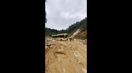 Vietnam Rescue: See the Incredible Moment a Tourist Bus is Freed From Mud!