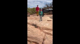 6 Year Old Rope Swings Off Cliff in Moab