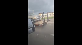Truck Strapped Down Improperly on Trailer