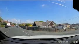 Caught on UK dashcam car fails to giveaway and pulls out in front of car on main road causing it to brake heavily and sound horn as a warning to avoid collision.