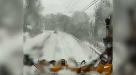MOMENT - Plow truck crashes with vehicle in New York