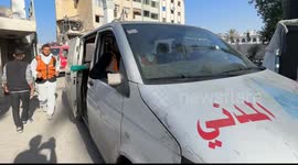 Civil defense teams relocate bodies of Palestinians killed in Israeli attacks