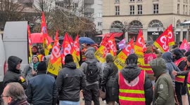French auto workers march against potential factory shutdown in Paris