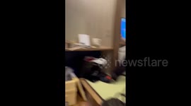 Residents cling onto TV as 7.5-magnitude earthquake triggers tsunami warning in Japan