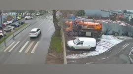 Lorry overturns after swerving to avoid woman on zebra crossing