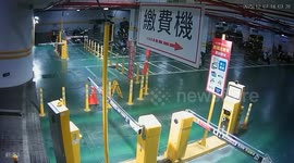 Out-of-control car crashes through barrier