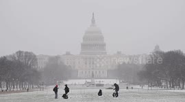 Season’s first snowfall blankets Washington, DC