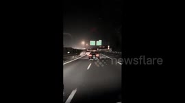 China: Tesla Driver Uses Rapid-Fire Rear Fog Lights to Counter Slow Red Car, Leaving Viewers Amused