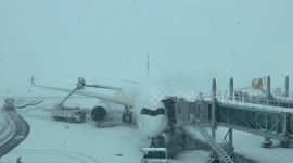 Severe snowfall blankets New Chitose Airport in Hokkaido, Japan