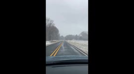 Unexpected snow blankets landscape after storm in Henderson, USA