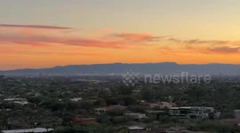 Desert sunset and cold moonrise create stunning view in Scottsdale, Arizona, USA