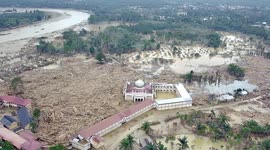 Piles of Wood Destroy Villages in Aceh