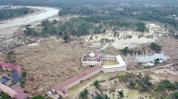Piles of Wood Destroy Villages in Aceh