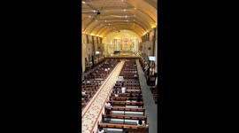 Girl wearing devil horns creates humorous moment in church in San Pablo, Philippines