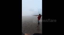 China: Fisherman Shocked After Reeling in Fish Resembling Extinct Chinese Paddlefish, Quickly Releases It