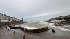 UK: Towering Waves Pound Porthleven Harbor In Violent Seas